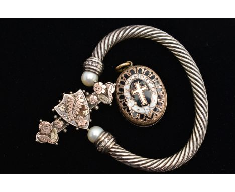 A TORQUE BANGLE, LOCKET AND A SWEETHEART BROOCH, the torque bangle of a twisted rope design, each terminal is set with a cult