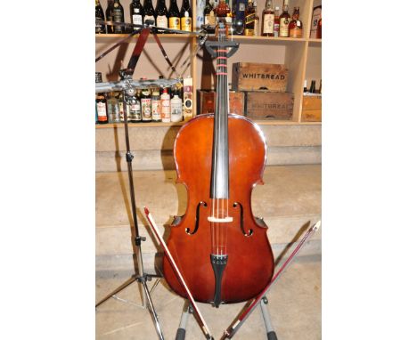 A FORENZA F2450A 4/4 CELLO with a laminated Spruce top, laminated back and sides, Mahogany neck, ebony fingerboard along with