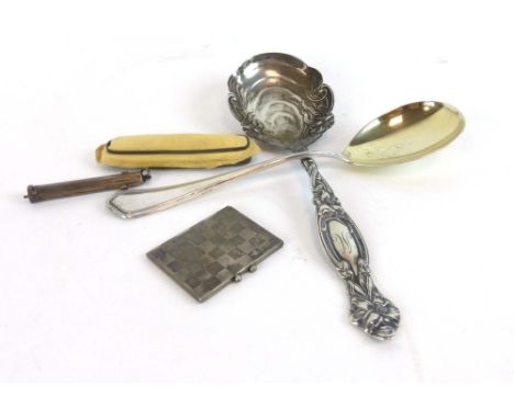 A German metalware miniature photograph frame decorated in a chequerboard pattern, l. 5 cm, a German metalware serving spoon,