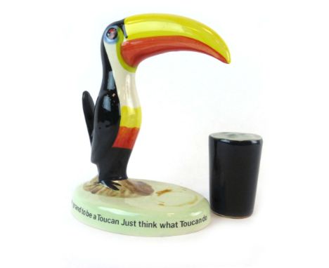 A Carlton Ware lamp base modelled as a toucan and advertising Guinness, h. 21 cm CONDITION REPORT: Pint glass detached and ha