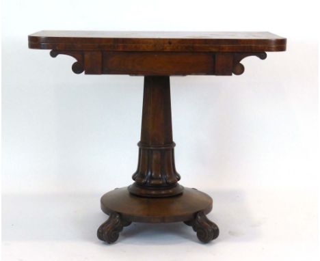 A 19th century rosewood card table, the folding surface over a turned column, platform base and four scrolled feet, w. 90 cm 