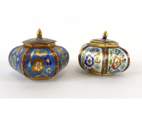 A pair of champleve enamel jars and covers of hexagonal form, h. 5.5 cm