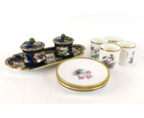 A set of six Royal Worcester coffee cans and saucers, each decorated with a different spring flower, together with a Booths t