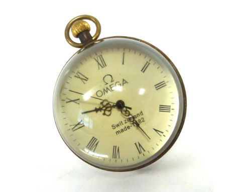 A globe pendant desk clock attributed to Omega, d. 6 cm