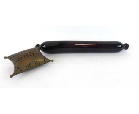 A Victorian blue glass rolling pin together with a brass pillow-shaped pot-pourri