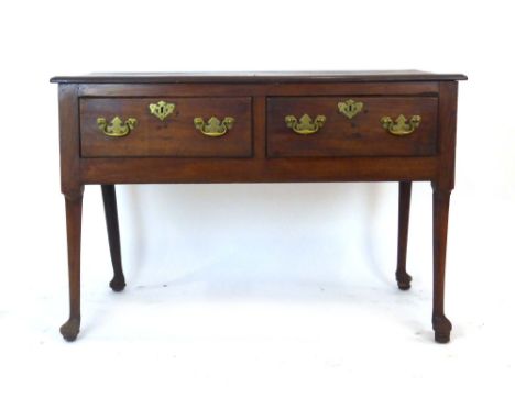 For Restoration: a George II oak dresser base on circular legs with pad feet, l. 116 cm CONDITION REPORT: Shrinkage, splits, 
