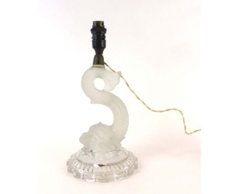 A moulded glass lamp base in the form of a stylised dolphin, h. 34 cm including fitments CONDITION REPORT: Working order unkn