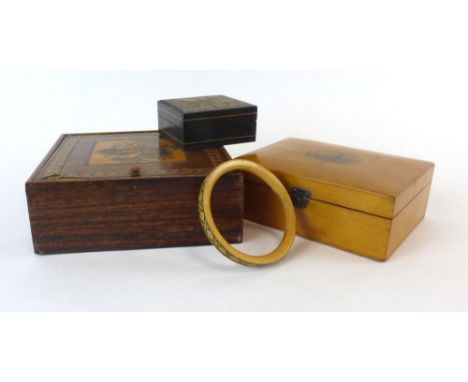A Tunbridge ware marquetry box, w. 16 cm, together with a similar stamp box, a marquetry bangle and a Sorrento-type box depic