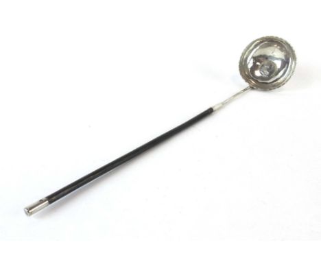 A Georgian metalware toddy ladle inset with a George III coin and having a horn handle, l. 31 cm CONDITION REPORT: No visible