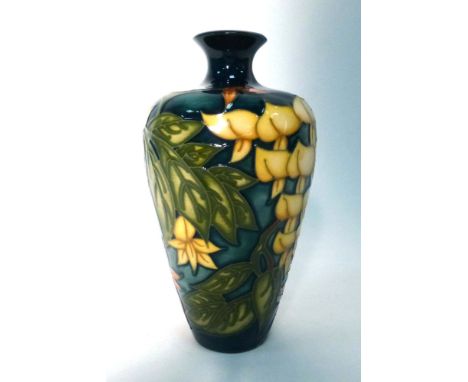 A Moorcroft vase of baluster form decorated in the Wisteria pattern, designed by Philip Gibson, Moorcroft Collectors Club No.