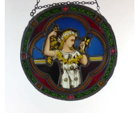 A stained glass and leaded tondo, d. 31 cm   CONDITION REPORT:  Two amethyst coloured sections both cracked.Others appear to 