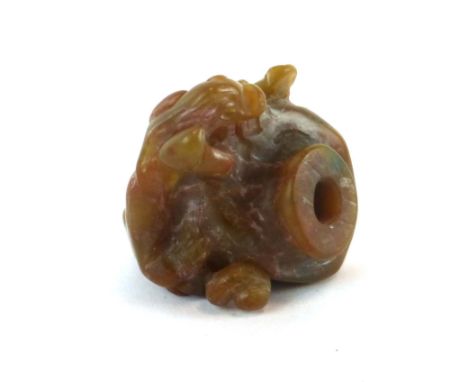 A Chinese carved jade phial of archaic form, l. 6.5 cm CONDITION REPORT: Some minor wear