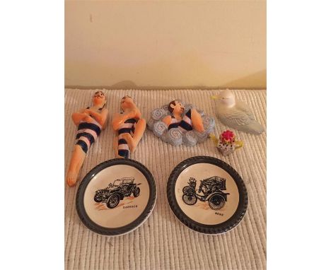 3 seaside wall plaques and 2 Wade veteran car plates