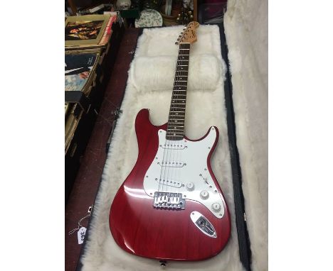 A Tanglewood guitar and case