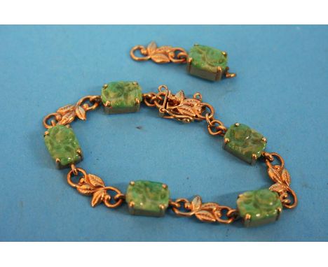 A 9ct gold and jade set bracelet