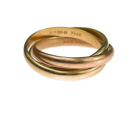 A 9ct tri-colour gold Russian wedding ring. With three interlocking bands, London 1987, size K 1/2, 4.9g.