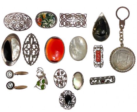 A selection of 925 silver brooches. Including a Mexican silver stone set modernist brooch pendant, an opal set 925 brooch, a 