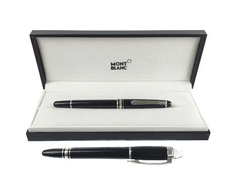 Two Mont Blanc roller ball pens. One in a presentation box with booklet; the other loose and with two cracks to the body.Thes