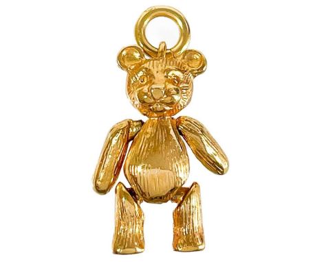 A 9ct articulated teddy bear charm.  Birmingham 1990, length 22mm, 6.47g.