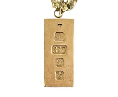 A heavy 9ct hallmarked ingot pendant on a 9ct belcher link chain. The ingot hallmarked 1978, length 36mm, 62.9g, the belcher 