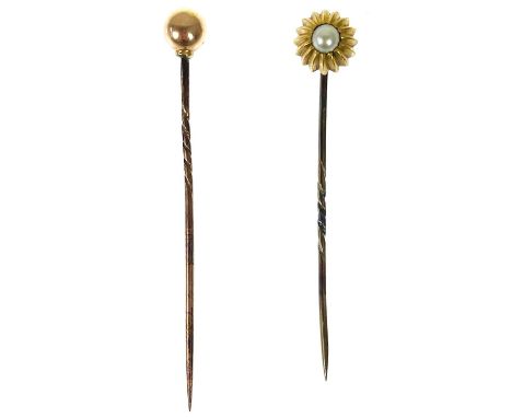 Two gold stick pins. One set with a pearl, 3.43g.