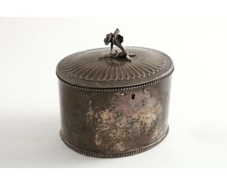 A GEORGE III OVAL TEA CADDY  with bead borders &amp; a low-domed fluted cover with a cast flower finial, with lock, maker's m