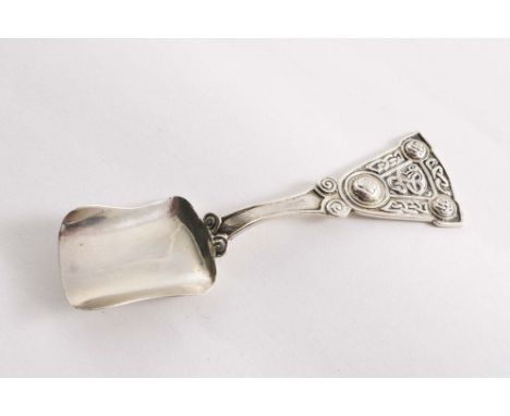 A SCOTTISH PROVINCIAL CADDY SPOON with a scoop bowl and a triangular terminal decorated with "Celtic" knots &amp; bosses, by 