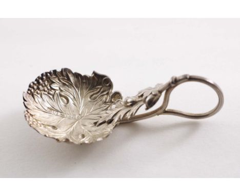 A VICTORIAN "STAMPED" CADDY SPOON with a vine leaf and grape-decorated bowl and a coiled tendril handle, by George Unite, Bir