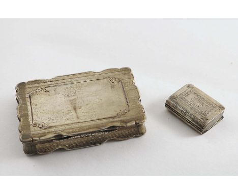 A GEORGE III SMALL ENGRAVED VINAIGRETTE resembling a book, gilt interior, by Cocks &amp; Bettridge, Birmingham 1802 and a Vic