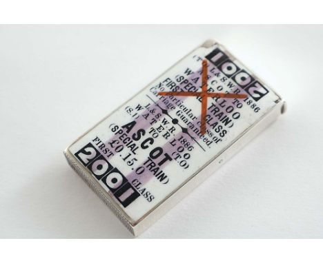 A VICTORIAN RECTANGULAR VESTA CASE with a flip cover, enamelled on the front to resemble a first class train ticket, Waterloo