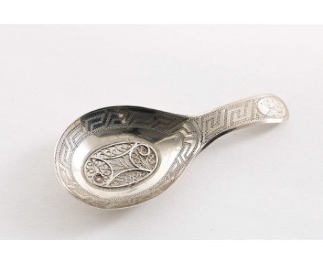 A GEORGE III CADDY SPOON with an inset filigree panel in the bowl and engraved, Greek-key borders, initialled "R", by Samuel 
