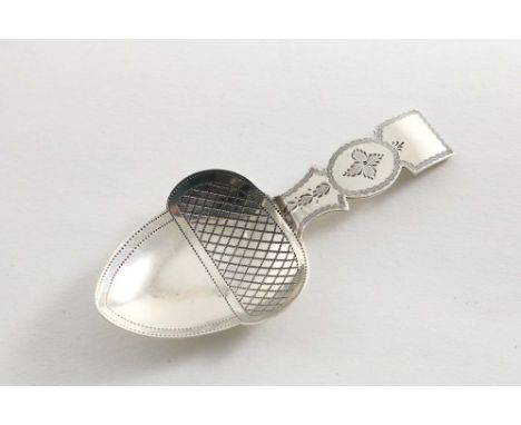 A GEORGE III ENGRAVED CADDY SPOON with an acorn-shaped bowl, by Elizabeth Morley, London 1808;  3.25"  (8.2 cms) long;  0.25 