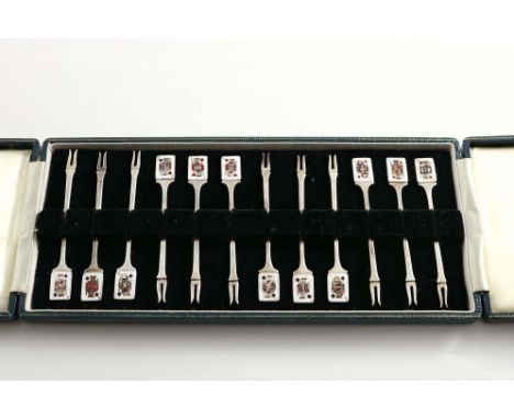 A LATE 20TH CENTURY CASED SET OF TWELVE COCKTAIL STICKS with enamelled playing card terminals (Jack, Queen, &amp; King of eac
