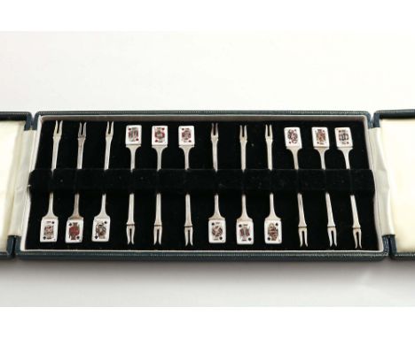 A LATE 20TH CENTURY CASED SET OF TWELVE COCKTAIL STICKS with enamelled playing card terminals (Jack, Queen, &amp; King of eac