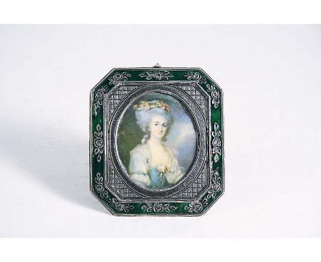 FRENCH SCHOOL c.1900 A miniature portrait of a lady with flowers in her hair, half length on ivory, indistinctly signed; 5.5 