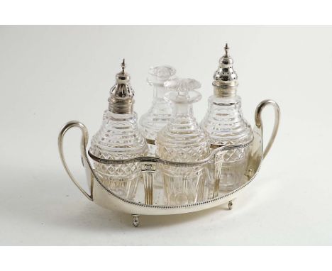 A GEORGE III BOAT-SHAPED CRUET STAND with bead borders &amp; twin loop handles, crested, by J. Wakelin &amp; W. Taylor, Londo