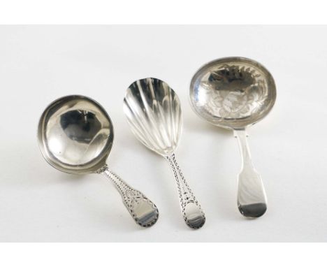 A GEORGE III CADDY SPOON with a bright-engraved Fiddle stem, by Elizabeth Morley, London 1805, another George III bright-cut 