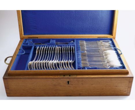 A CANTEEN OF FIDDLE, THREAD &amp; SHELL PATTERN FLATWARE diamond shell heel), in an oak, fitted box including:- eleven table 