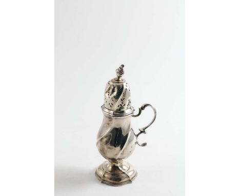 A LATE 18TH CENTURY DUTCH BALUSTER CASTER with wrythen body, a scroll handle &amp; a high-domed cover with engraving and a fl