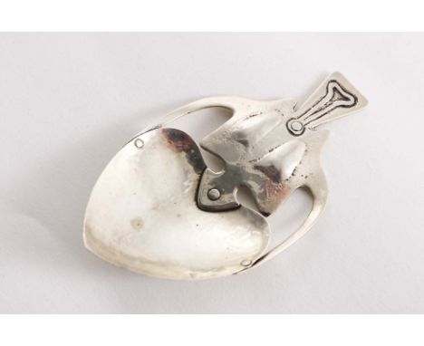 A LATE VICTORIAN ART NOUVEAU CADDY SPOON with a heart-shaped bowl and sinuous handle, rivetted to the bowl, by Liberty &amp; 