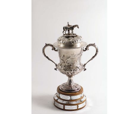 THE CHARD AGRICULTURAL SHOW CUP:- A Victorian trophy cup &amp; cover with embossed decoration with a horse on one side and th