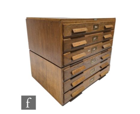A 1930s light oak plan chest, the 'Arclight', in two sections, maker's tablet by N Mason and Sons Limited Colchester, height 