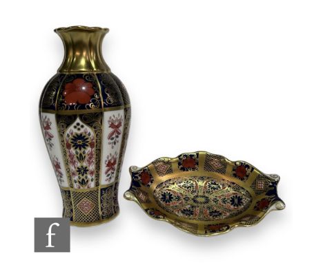 A Royal Crown Derby 'Old Imari' 1128 pattern vase and trinket dish, vase height 18cm, dish 13cm long, both boxed. (2) 