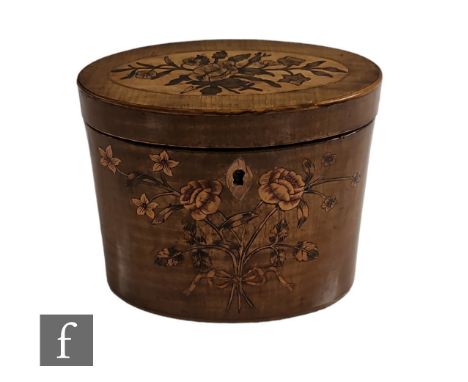 An early 19th Century sycamore oval tea caddy with marquetry floral detail to both the front and the hinged cover, some later