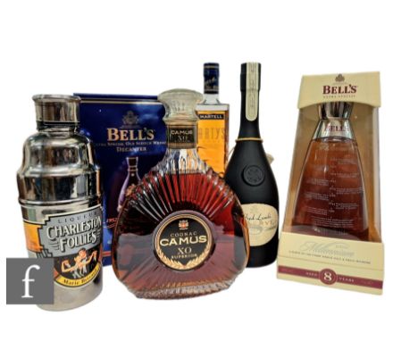 A collection of various whiskies and spirits, to include Bell's Extra Special 2000 Millennium, boxed, Alfred Lamb's Reserve e