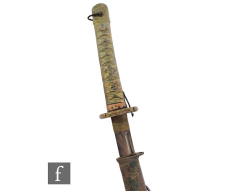 A World War Two Japanese Katana, simulated fish skin hilt, brass tsuba, metal scabbard, blade 68cm. 