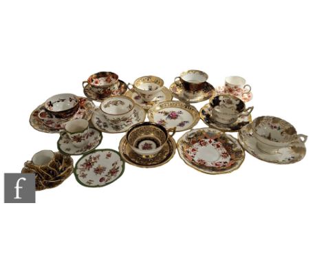 A collection of 19th Century and later china tea and coffee cups and saucers, mostly English, most decorated with floral and 