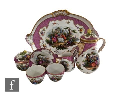 AMENDED DESCRIPTION - A late 19th to early 20th Century Meissen Cabaret set in the manner of Teniers or Kaufmann, the set com