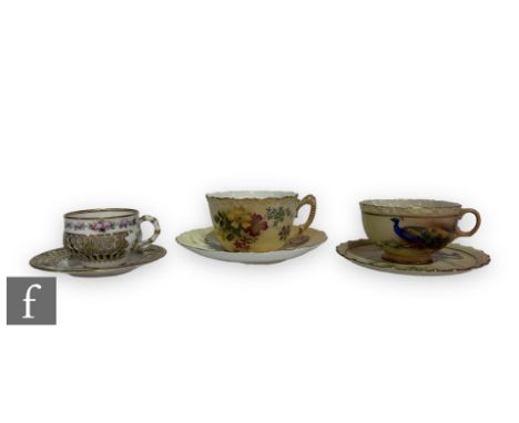 A miniature Worcester reticulated cabinet cup and saucer, the double walled cup with reticulated outer walls highlighted in g