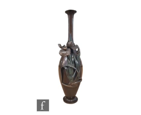 A Japanese Meiji Period bronze vase of bottle form, cast in relief with orchid and foliage, height 26cm. 